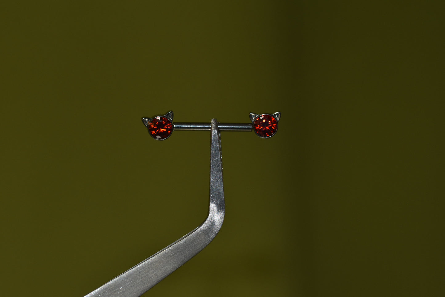 Garnet Kitty Nipple Piercing