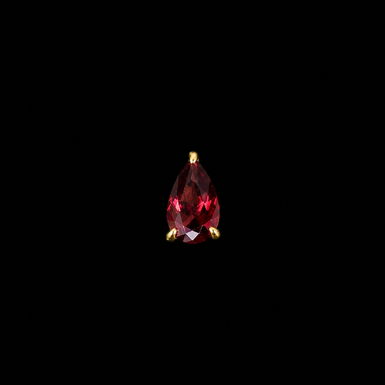 14K Teardrop Garnet stud